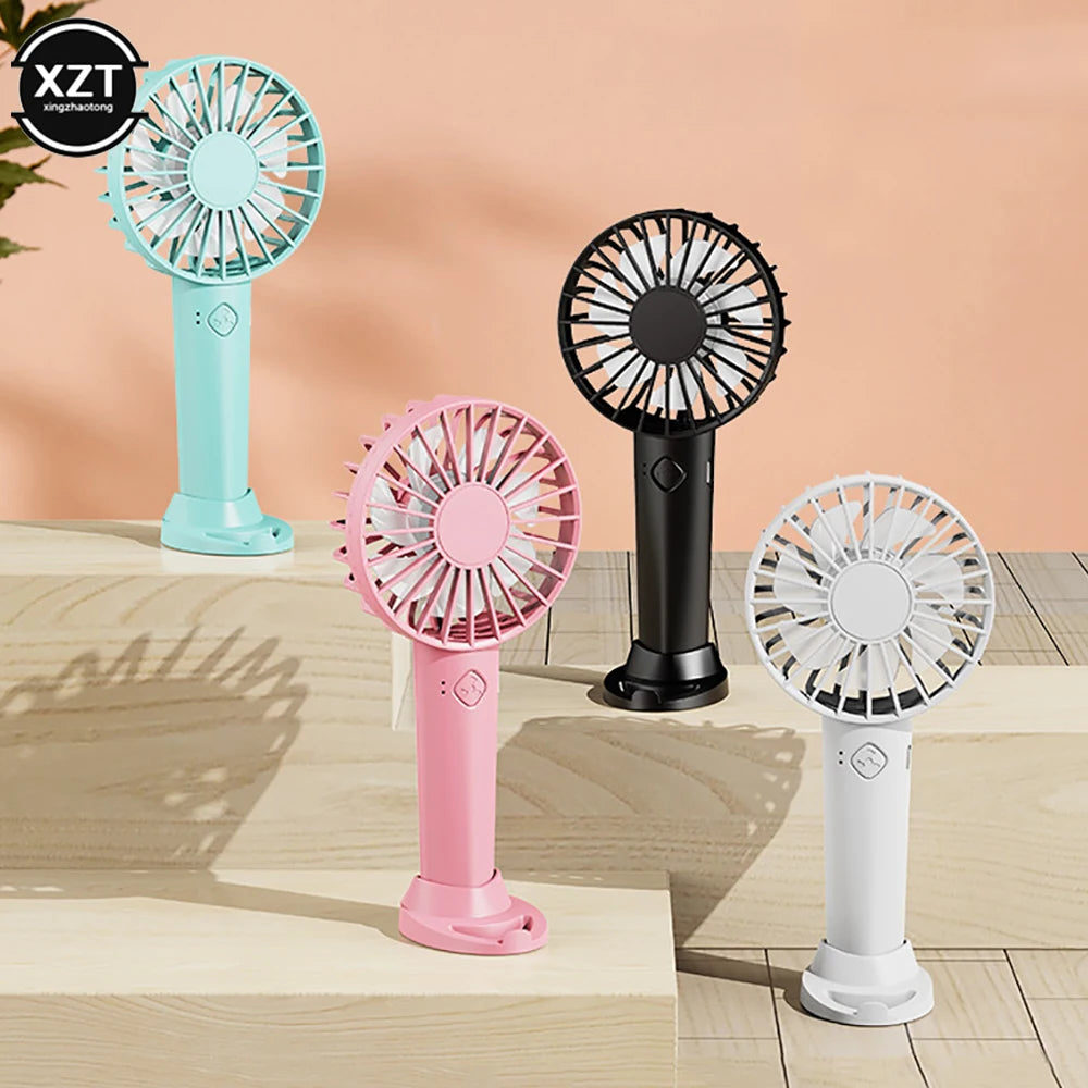 2023 USB Mini Strong Wind Handheld Fan USB Rechargeable Mini Desktop Air Cooler Outdoor Fan Cooling Travel Hand Fans For Outdoor